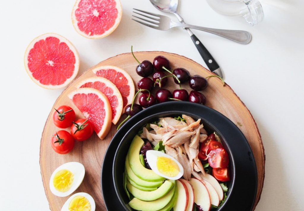 Tray showing a variety of healthy food selections.